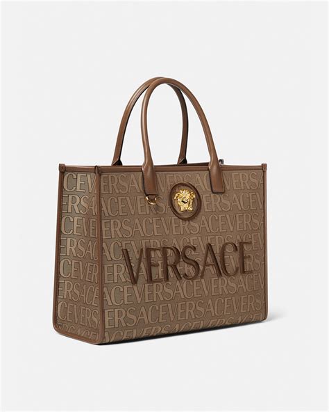 versace bags on sale|versace handbags with big zipper.